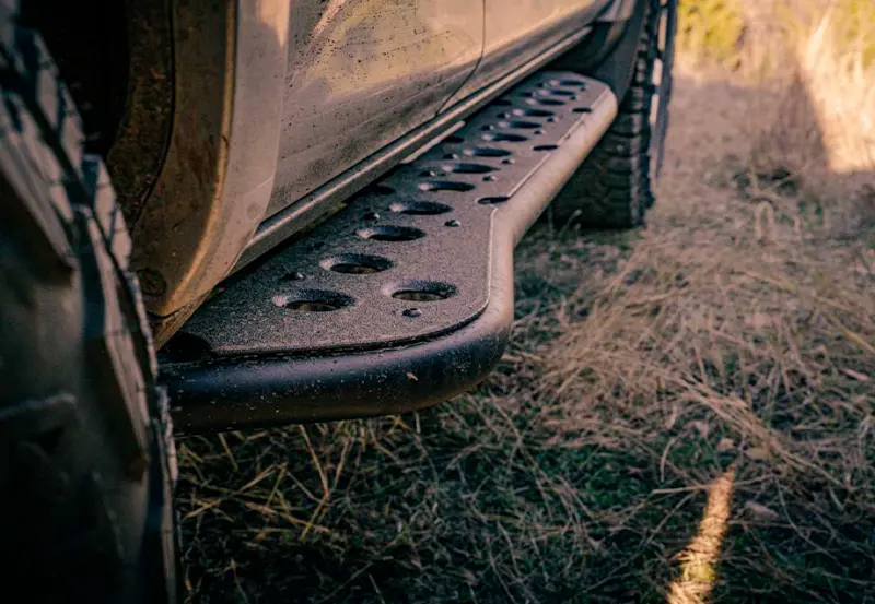 Cali Raised Rock Sliders With Step Edges For 1995–2023 Toyota Tacoma Double Cab Long Bed 1
